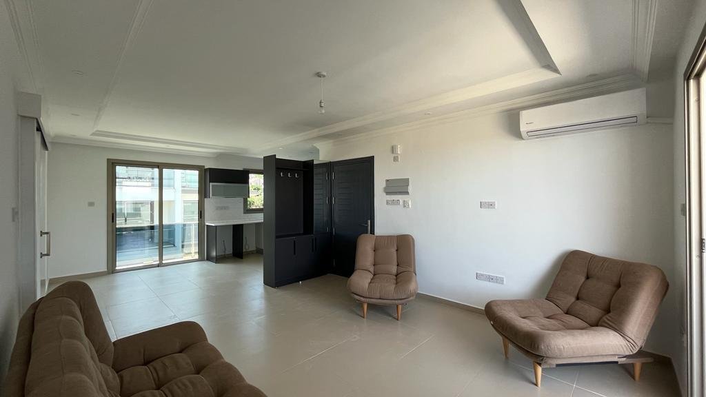 FULLY FURNISHED 2+1 FLAT WITH ALL EXPENSES PAID FOR SALE IN GIRNE ALSANCAK